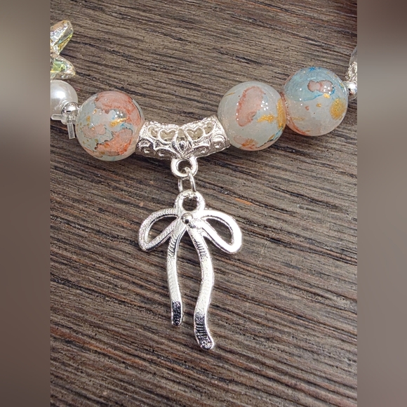 Beach Glass Beaded Bracelet – Starfish & Bow Charm  +Free Gift 🎁 - Picture 3 of 7